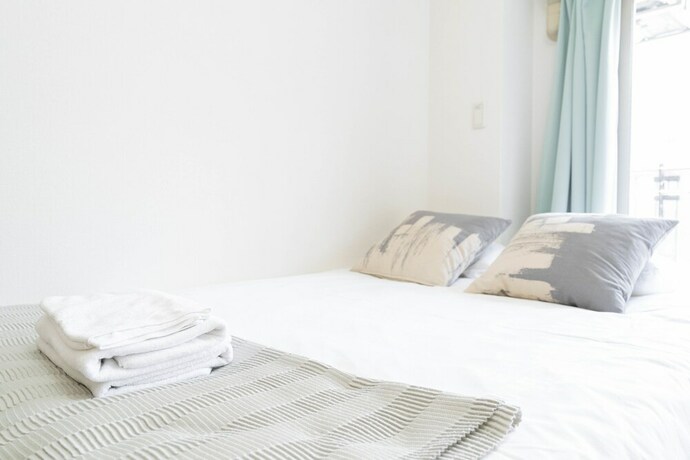Imagen de la habitación del Shinsaibash East Nana Apartment &middot; Junan. Foto 33