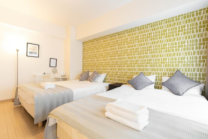 Imagen de la habitación del Shinsaibash East Nana Apartment &middot; Junan. Foto 34