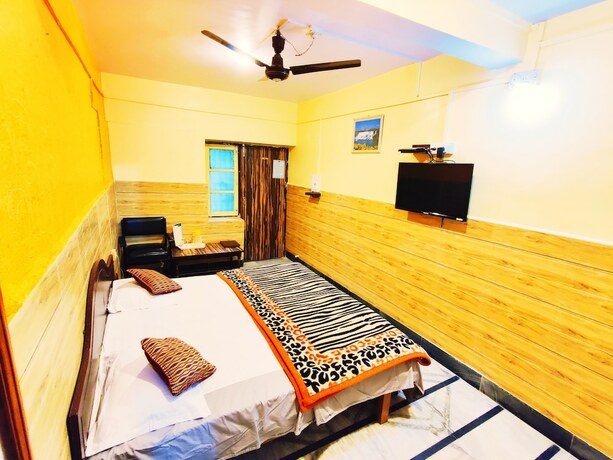 Imagen de la habitación del Shri Ganesh Hotel. Foto 9