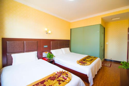 Imagen de la habitación del Shu Xin Hotel. Foto 10