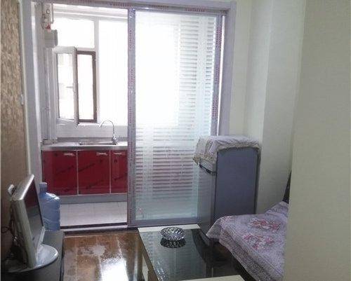 Imagen de la habitación del Shuiyunxuan Service Apartment. Foto 2