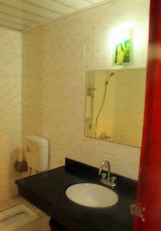 Imagen de la habitación del Shunan Zhuhai Home Inn. Foto 1