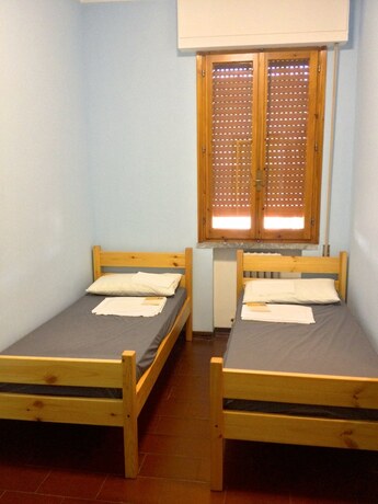Imagen de la habitación del Siena Hostel Guidoriccio. Foto 13