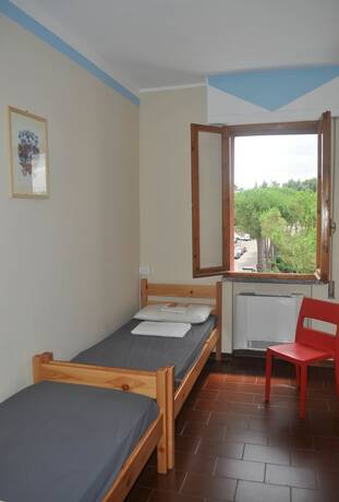 Imagen de la habitación del Siena Hostel Guidoriccio. Foto 16