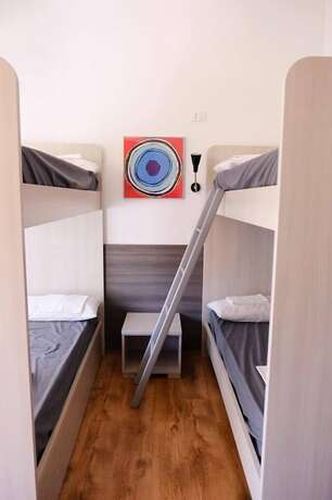 Imagen de la habitación del Siena Hostel Guidoriccio. Foto 18