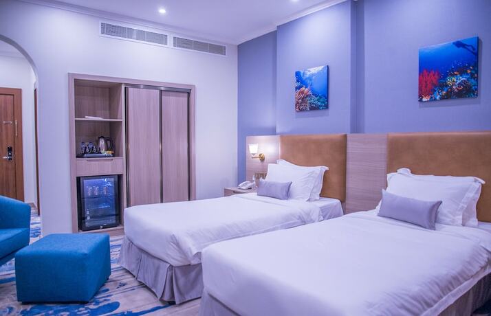 Imagen de la habitación del Signature Hotel. Foto 16