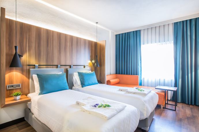 Imagen de la habitación del Signature Hotels And Spa. Foto 13