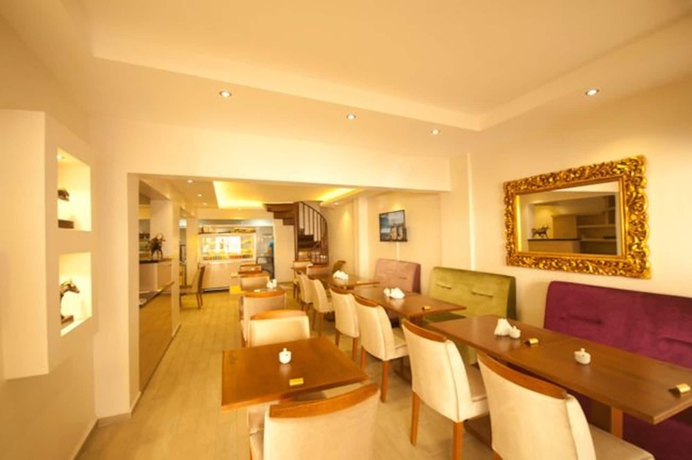 Imagen del bar/restaurante del Simal Butik Hotel. Foto 3