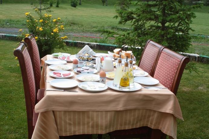 Imagen del bar/restaurante del Sim-er Hotel. Foto 3