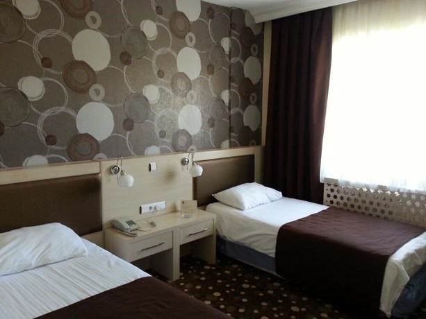 Imagen de la habitación del Sim-er Hotel. Foto 11