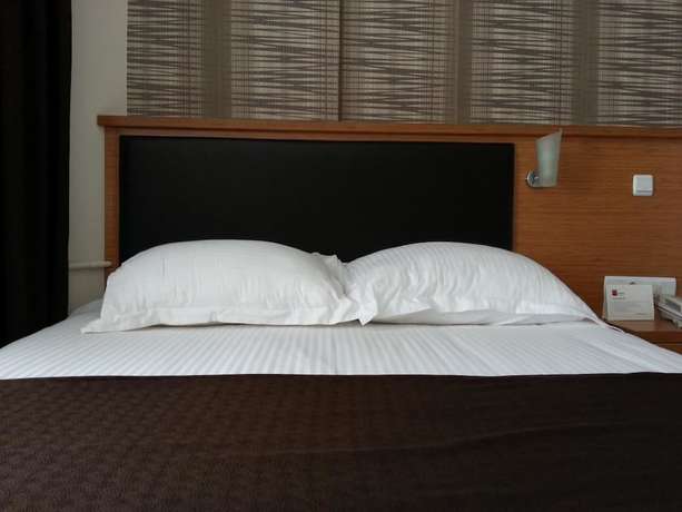 Imagen de la habitación del Sim-er Hotel. Foto 13