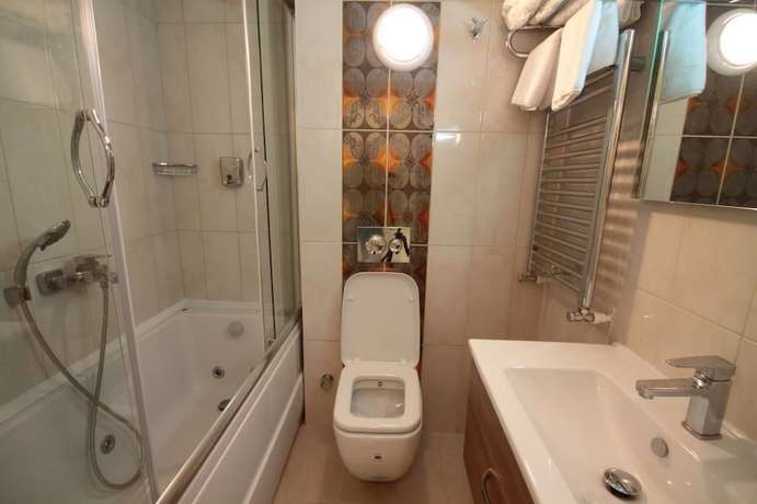 Imagen de la habitación del Sim-er Hotel. Foto 14