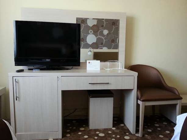 Imagen de la habitación del Sim-er Hotel. Foto 15