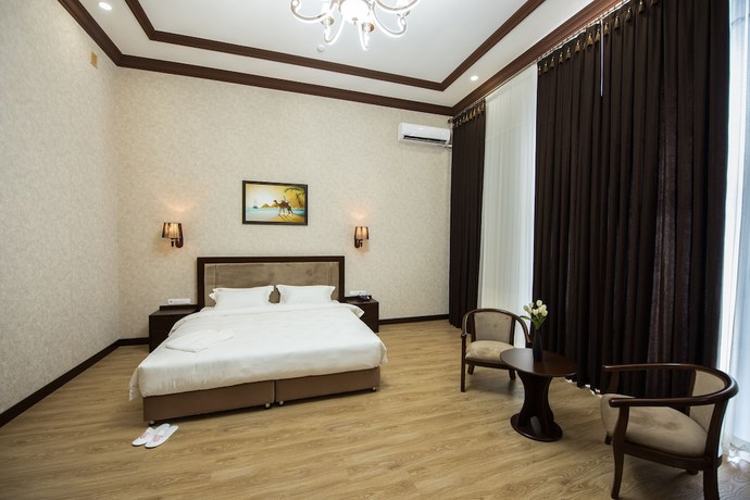 Imagen de la habitación del Simma Hotel spa and waterpark. Foto 11