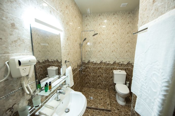 Imagen de la habitación del Simma Hotel spa and waterpark. Foto 12