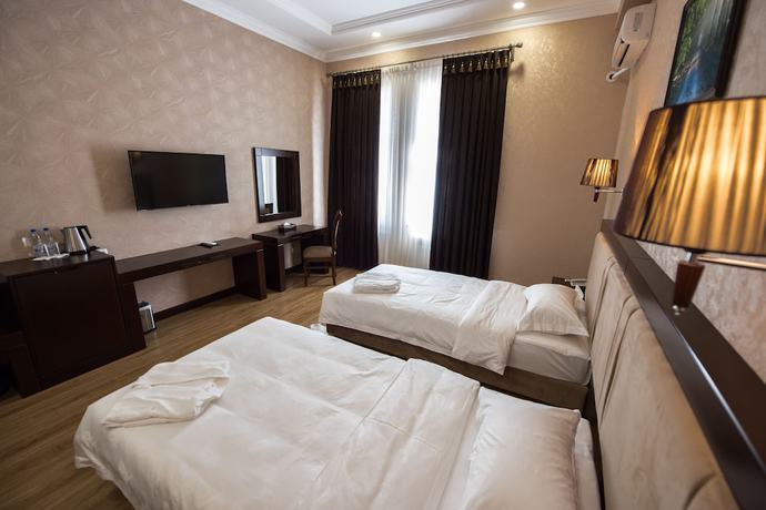 Imagen de la habitación del Simma Hotel spa and waterpark. Foto 13