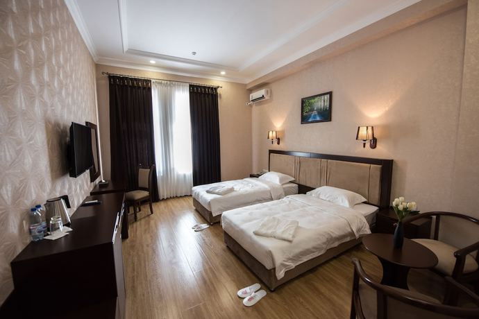 Imagen de la habitación del Simma Hotel spa and waterpark. Foto 15