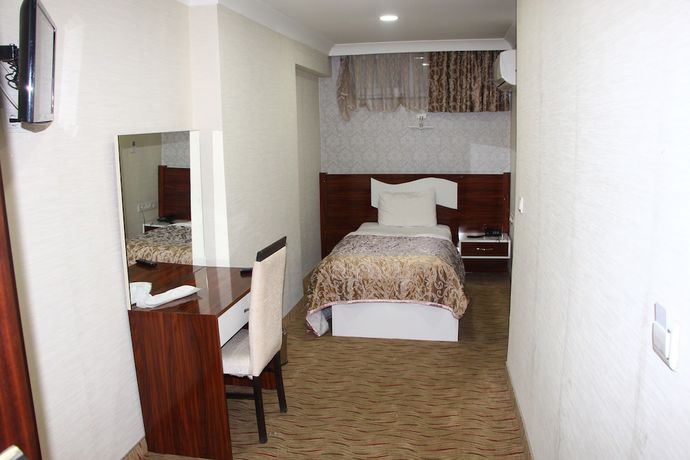 Imagen de la habitación del Sinan Hotel. Foto 9