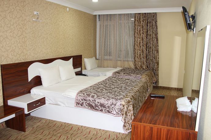 Imagen de la habitación del Sinan Hotel. Foto 16