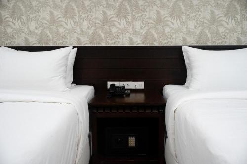 Imagen de la habitación del Singharaj Boutique Hotel. Foto 20