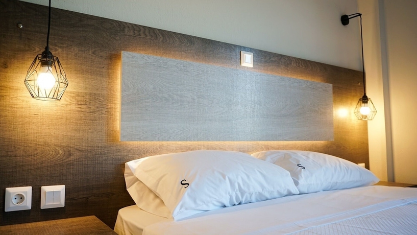 Imagen de la habitación del Sinodinos Deluxe Apartments. Foto 3