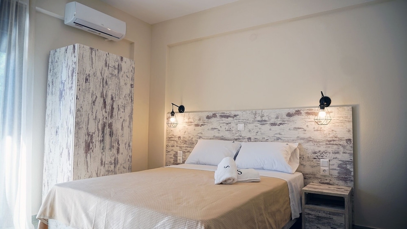 Imagen de la habitación del Sinodinos Deluxe Apartments. Foto 5