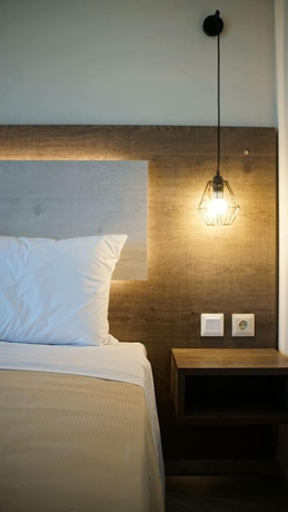 Imagen de la habitación del Sinodinos Deluxe Apartments. Foto 7