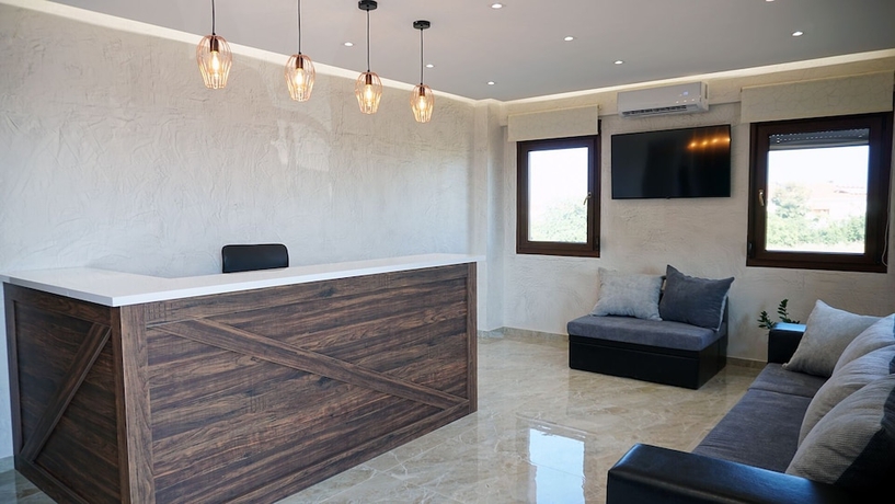 Imagen de los interiores del Sinodinos Deluxe Apartments. Foto 18