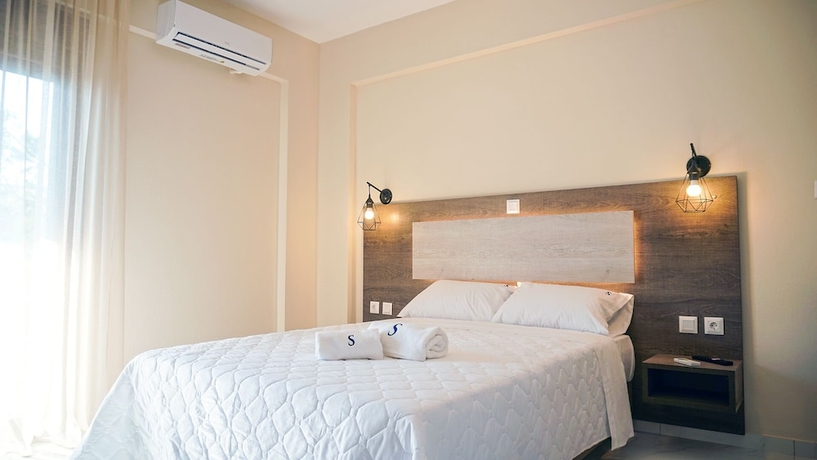 Imagen de la habitación del Sinodinos Deluxe Apartments. Foto 13