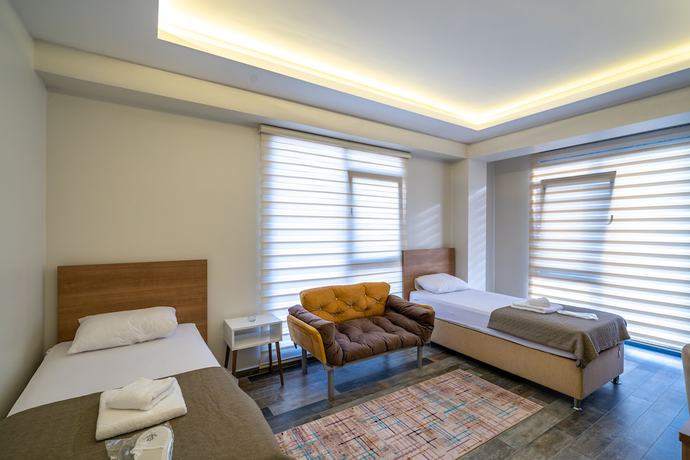 Imagen de la habitación del Sist 34 Suit Hotel. Foto 3