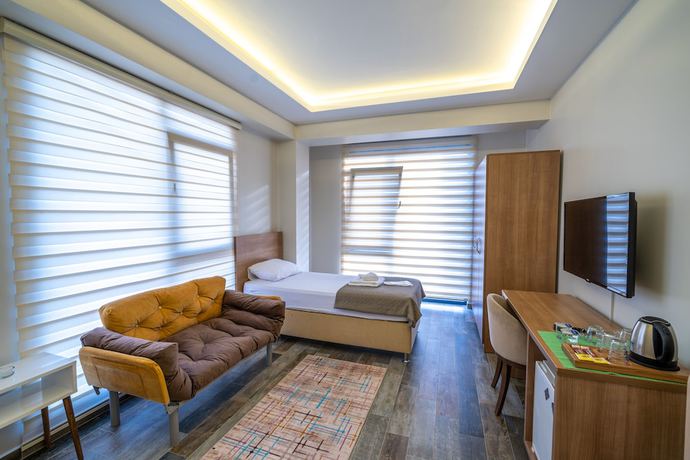 Imagen de la habitación del Sist 34 Suit Hotel. Foto 16