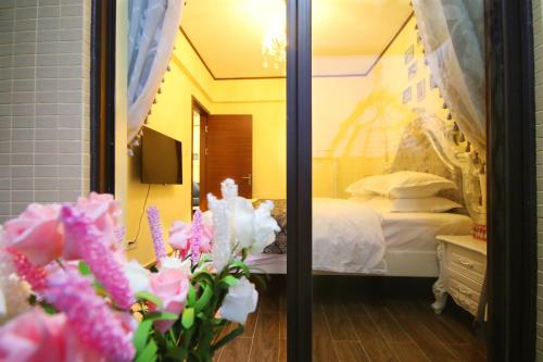 Imagen de la habitación del Siweideng Apartment. Foto 4