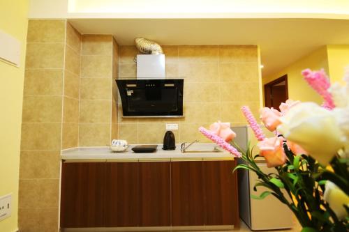 Imagen de la habitación del Siweideng Apartment. Foto 6