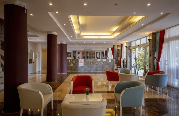 Imagen del bar/restaurante del Siz İnn Otel. Foto 3