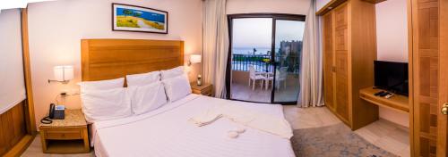 Imagen de la habitación del Sky View Suites Hotel. Foto 6