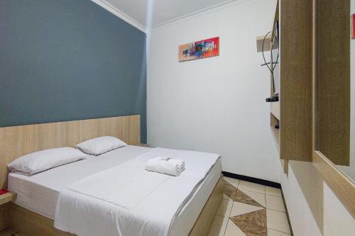 Imagen de la habitación del Skyland Guest House Mitra RedDoorz. Foto 19