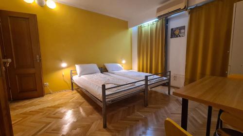 Imagen de la habitación del Sleep Inn Hostel. Foto 19