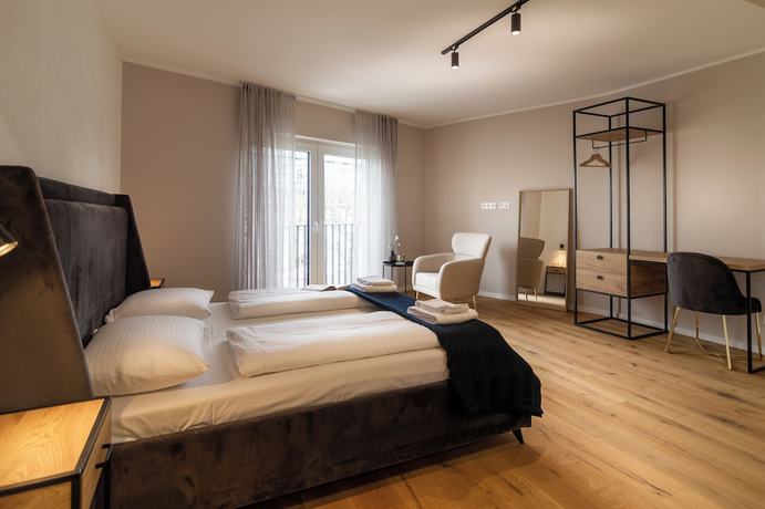 Imagen de la habitación del Sleep Inn Medienhafen Suites. Foto 17