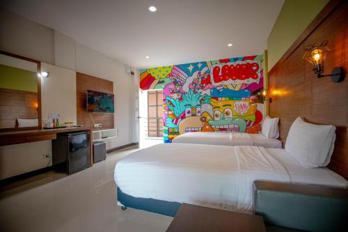 Imagen de la habitación del Smart Hotel, Pathum Thani. Foto 7
