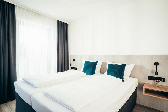 Imagen de la habitación del SmartLiving Apartments M&uuml;nchen. Foto 14