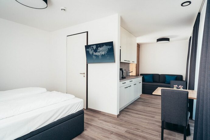 Imagen de la habitación del SmartLiving Apartments M&uuml;nchen. Foto 18