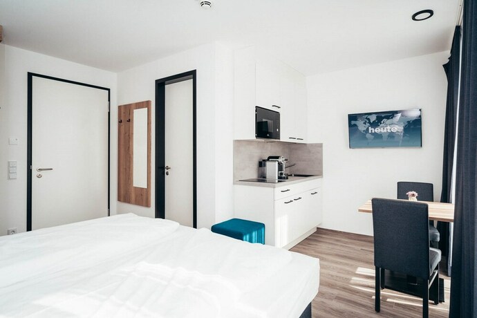 Imagen de la habitación del SmartLiving Apartments M&uuml;nchen. Foto 20