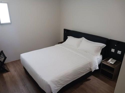 Imagen de la habitación del Soho Tabuan Kuching. Foto 8