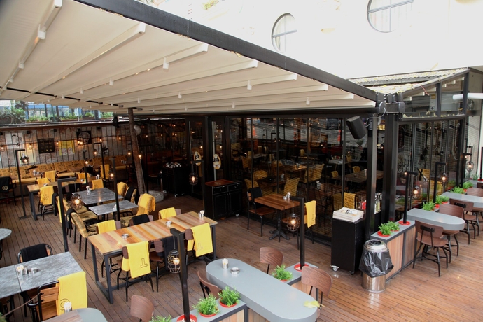 Imagen del bar/restaurante del Sonno Boutique Rooms And Suites. Foto 3