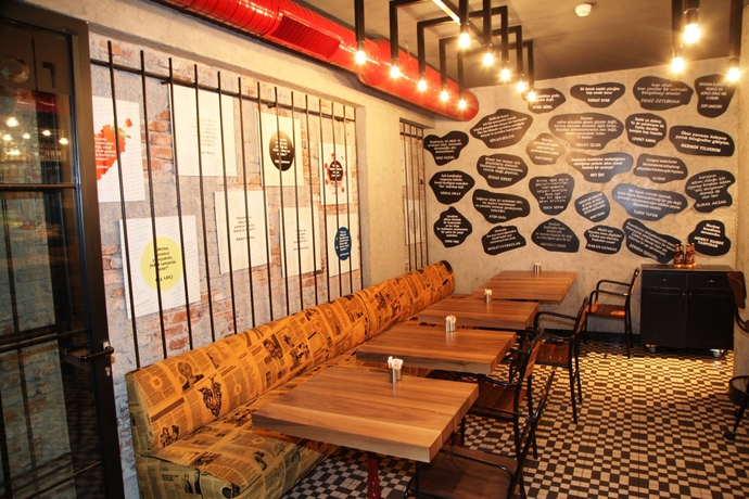 Imagen del bar/restaurante del Sonno Boutique Rooms And Suites. Foto 4