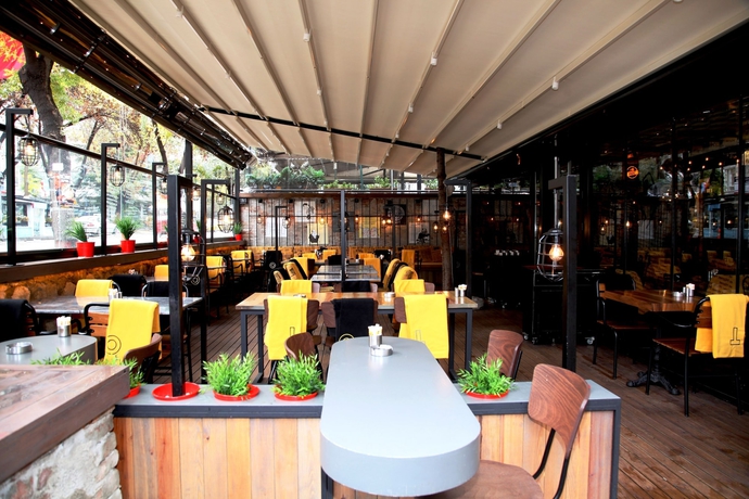 Imagen del bar/restaurante del Sonno Boutique Rooms And Suites. Foto 5