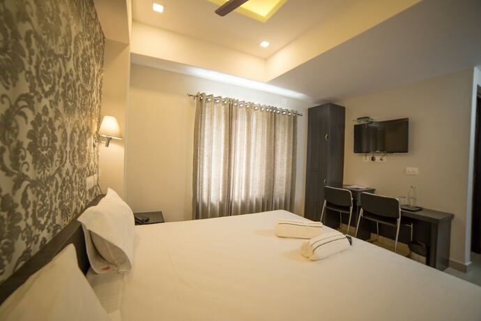 Imagen de la habitación del South Gate Residency. Foto 11