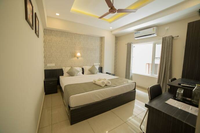 Imagen de la habitación del South Gate Residency. Foto 12