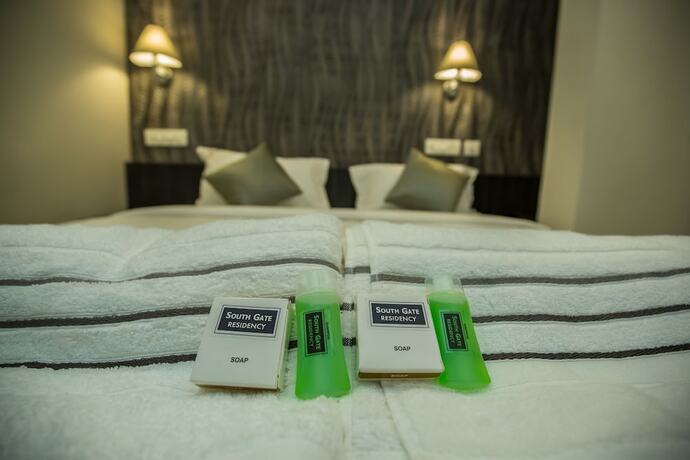 Imagen de la habitación del South Gate Residency. Foto 13