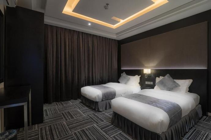 Imagen de la habitación del South Hotel Suites. Foto 1